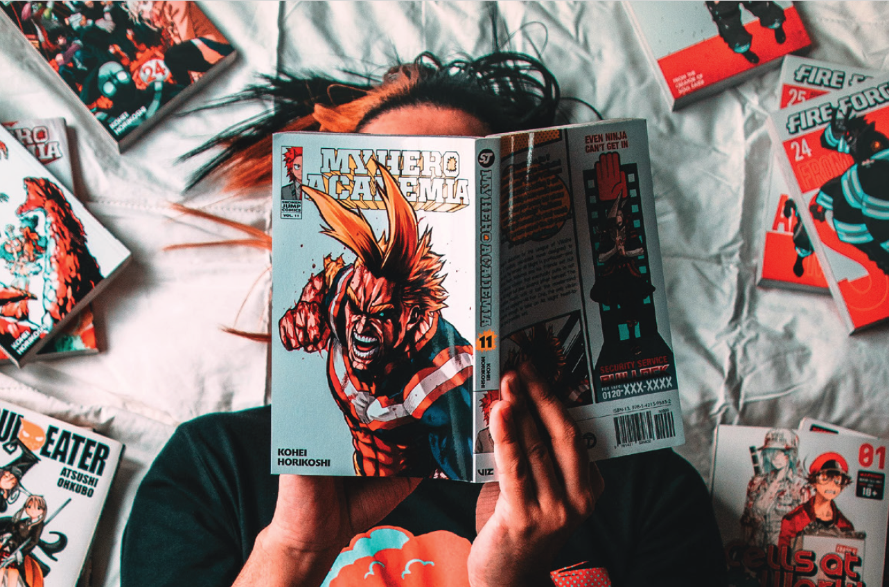 Manga book opened, showing covers